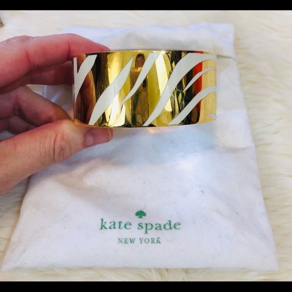 kate spade Jewelry - KATE SPADE Kick up your Heels White Gold Bangle